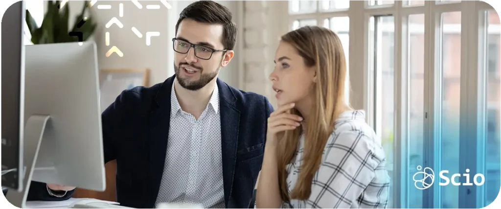 Senior engineer in a Sensei-Creati mentorship session guiding a junior developer with coaching-oriented conversation focused on the developer's personal growth goals