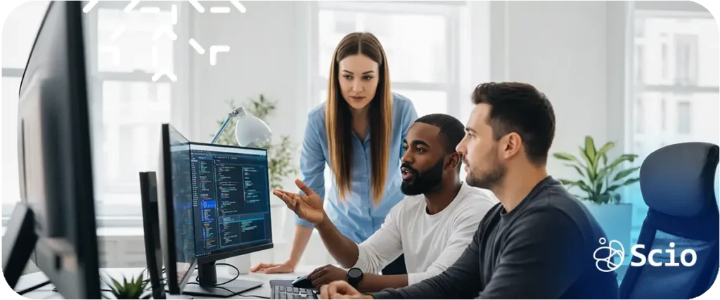 Engineering team in a code review or architecture session distributing knowledge and building shared ownership of the codebase to raise the Bus Factor