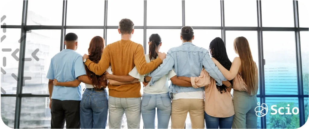 Diverse engineering team standing together with arms around each other, symbolizing unity, collaboration, and high-performance team building.