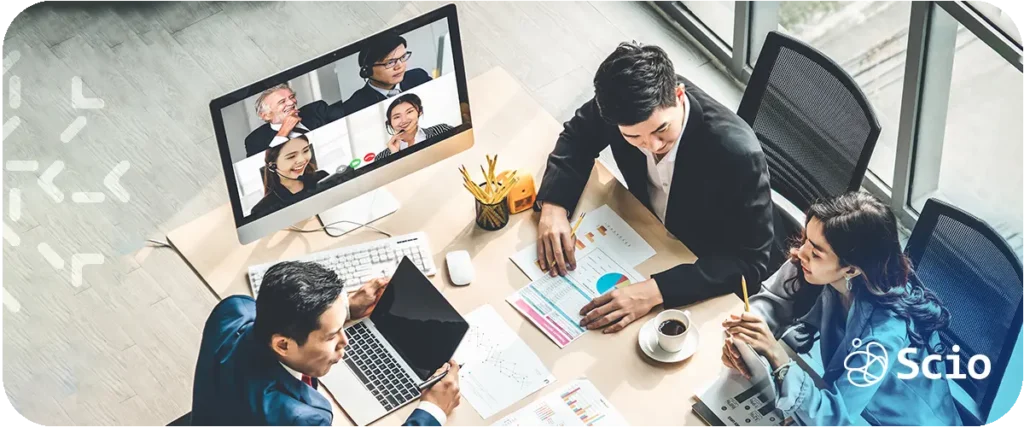 "Daily scrum best practices: engineering team in a focused standup meeting representing alignment, blocker removal, and outcome-focused collaboration in modern software delivery