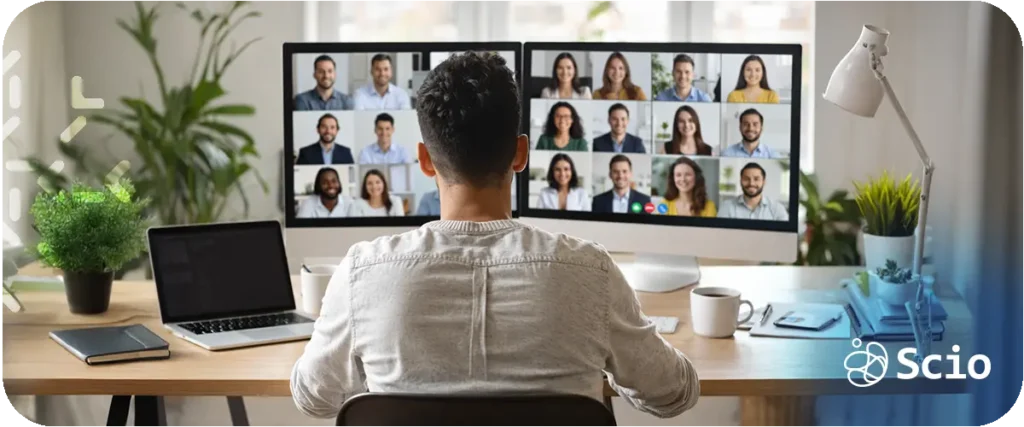 Distributed nearshore software team collaborating through real-time video meeting