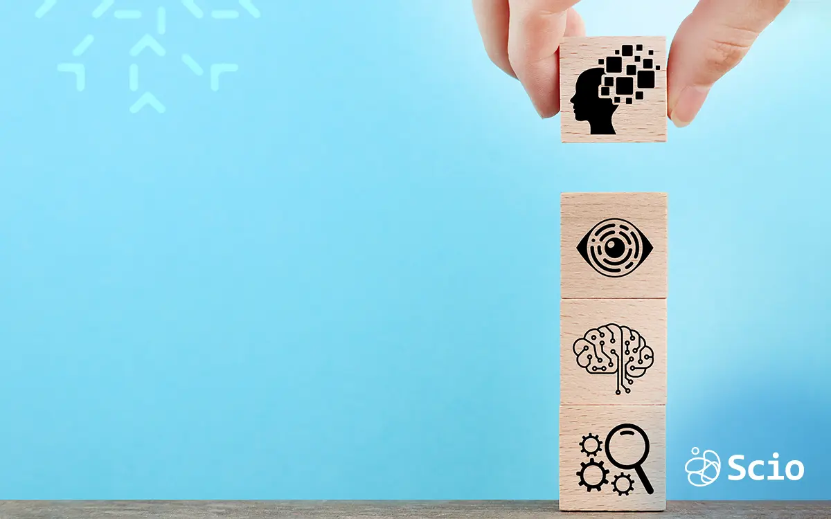 Recommended Communication Tools for Nearshore Teams Hands stacking communication icons on blocks to represent async and sync collaboration strategies.