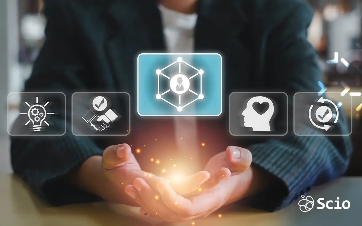 ech Coaching Concepts Visual Person holding glowing icons representing knowledge, collaboration, and innovation in a tech environment.
