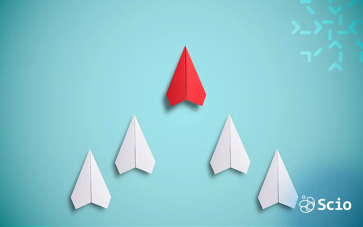 Red paper plane leading white planes upwards, representing a smooth transition from Waterfall to Agile methodology
