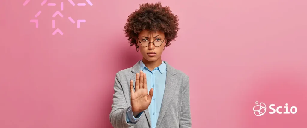 Person making a stop gesture with hand, representing rejection or saying no