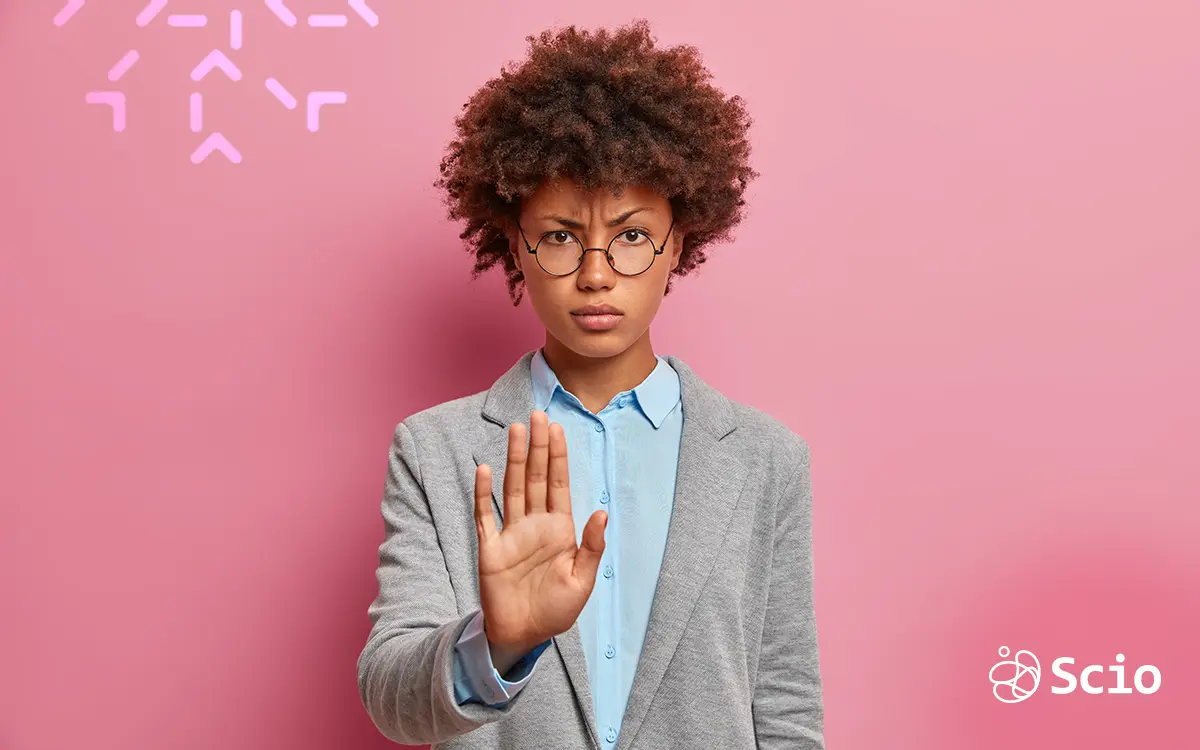 Person rejecting with hand gesture — cultural differences in saying “no” in business