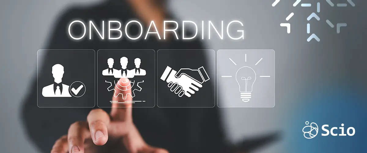 Person selecting onboarding icons on a digital screen, representing HR strategy and new hire integration.