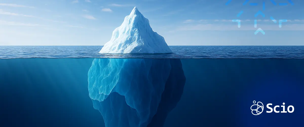 An iceberg with most of its volume hidden underwater, symbolizing unseen communication costs in offshore software outsourcing