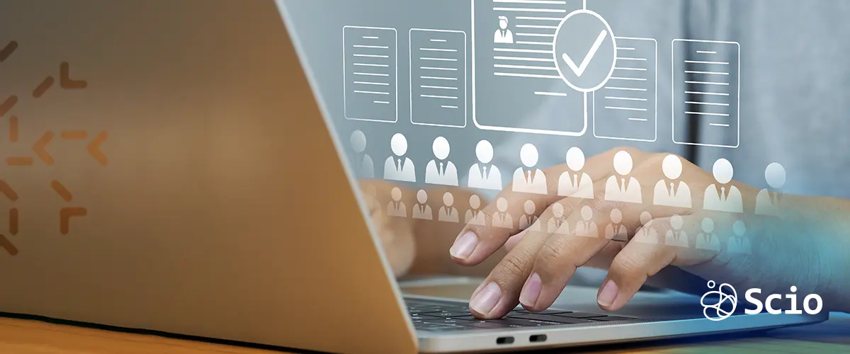Interview Screening & Candidate Validation – Scio Blog Laptop screen with profile icons and checkmarks, symbolizing interview screening and candidate selection in nearshore outsourcing