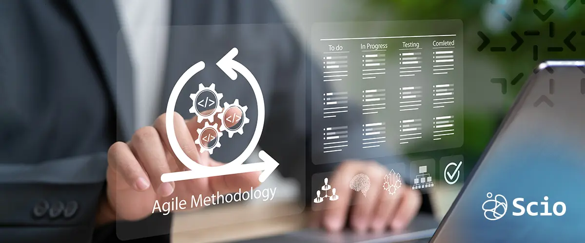 01 5 Questions to Ask Business professional reviewing Agile methodology dashboard while choosing a Lean Product Development partner