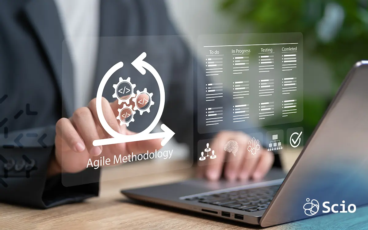 Business professional reviewing Agile methodology dashboard while choosing a Lean Product Development partner
