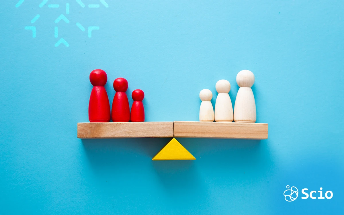Balance between dedicated agile teams and staff augmentation represented with red and white figures on a scale.