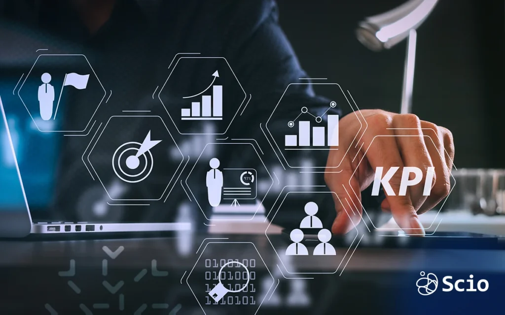 Outsourcing KPIs: business professional analyzing KPI dashboards for outsourcing performance measurement showing delivery quality cost and satisfaction metrics in a shared engineering partnership view