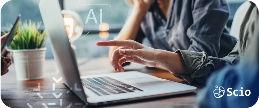 EAI reshaping engineering roles: engineer collaborating with AI-assisted development tools on a laptop illustrating the shift from software construction to software composition