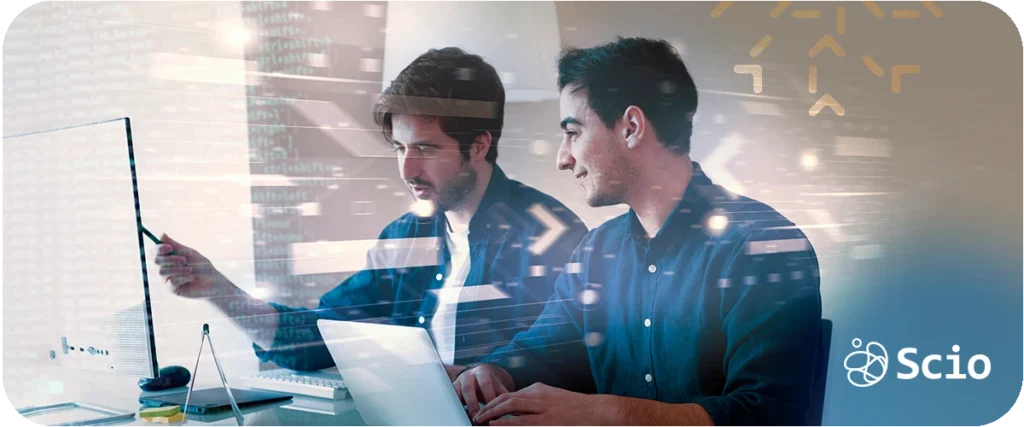 AI force multiplier: two software engineers reviewing code and architecture decisions representing how AI amplifies existing engineering fundamentals rather than replacing judgment