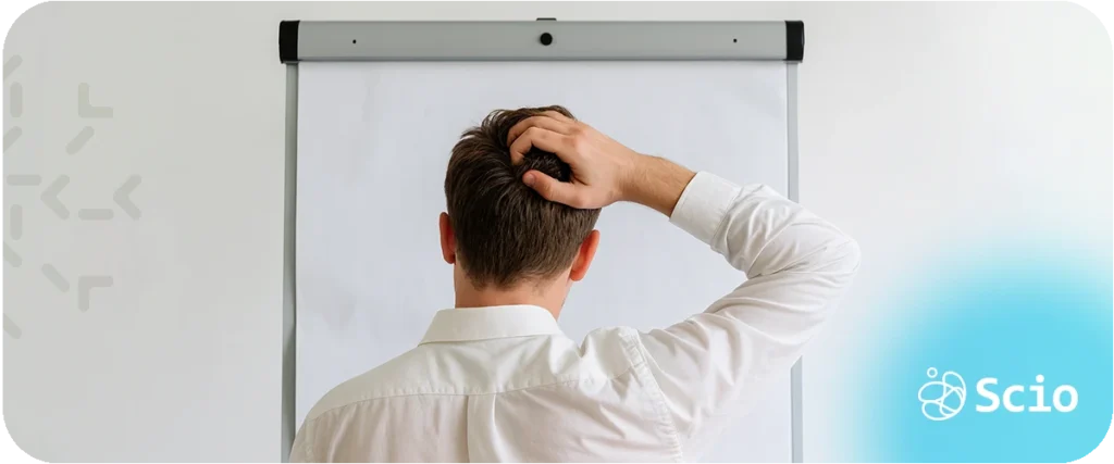 Tech lead anxiety: software engineering leader reflecting at whiteboard under the pressure of team leadership and delivery responsibility.