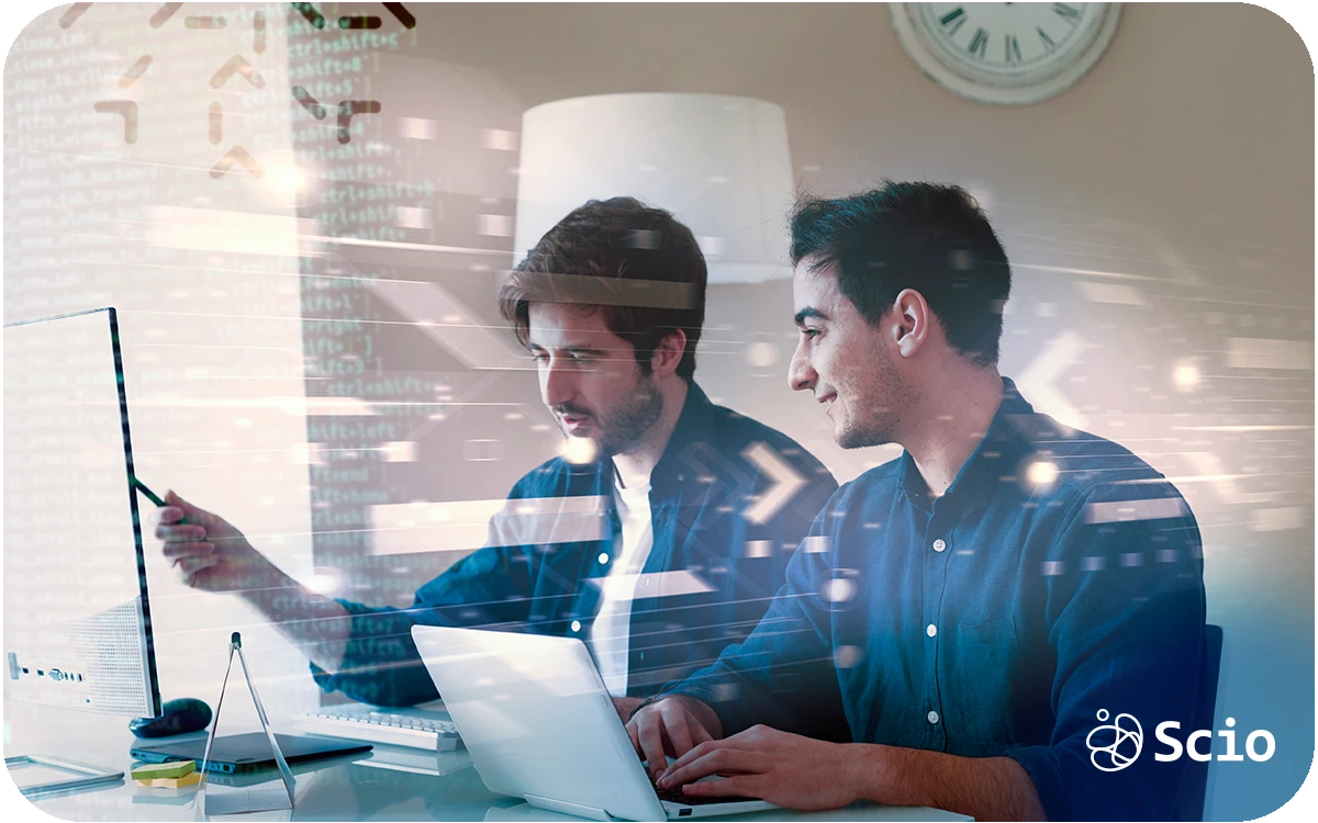 AI amplifying collaboration between two software engineers reviewing code and architecture decisions