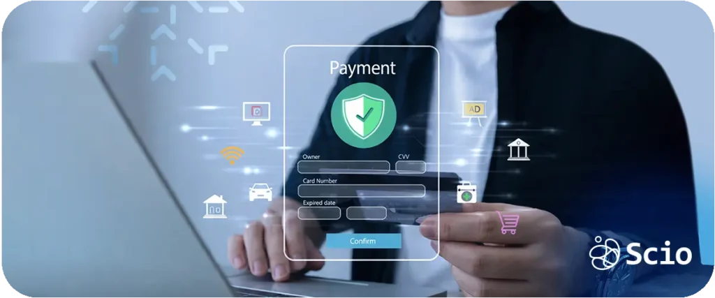 Engineer interacting with digital payment and security interfaces on a laptop in a fintech environment