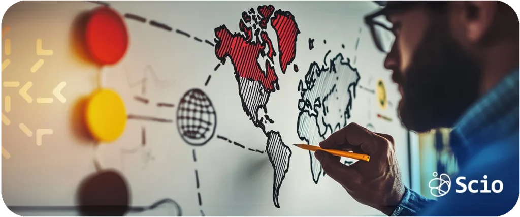 Outsourcing to Latin America: software development manager at a desk reviewing a strategic outsourcing decision map with Latin American tech hubs highlighted