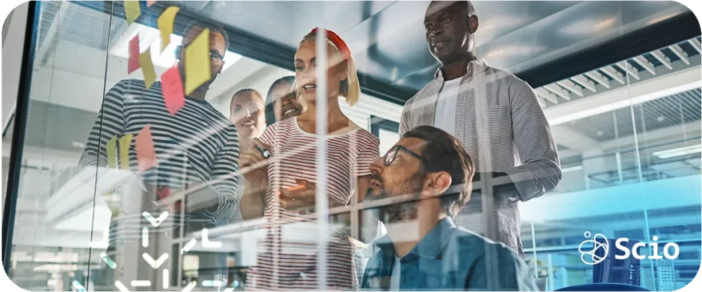 Leadership in an AI world: manager creating a space for genuine team conversation representing the shift from expert with answers to sense-maker and coach