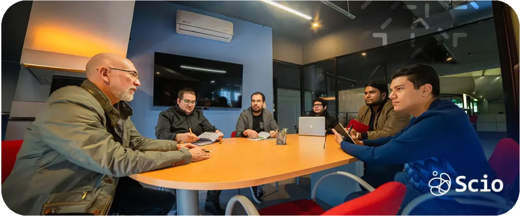 Scio engineer participating in mentorship session as part of Scio Elevate program representing intentional culture investment in developer growth